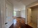 Spacious bedroom with gleaming wood floors and access to a bathroom with granite counters at 7320 Westpointe Blvd # 531, Orlando, FL 32835