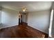 A spacious bedroom with wood floors and neutral walls perfect for creating a cozy retreat at 7320 Westpointe Blvd # 531, Orlando, FL 32835