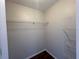 Walk in closet with wire shelving providing ample storage space at 7320 Westpointe Blvd # 531, Orlando, FL 32835
