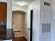 Entrance foyer featuring tile flooring, neutral walls, arched doorway, and entry closet at 7320 Westpointe Blvd # 531, Orlando, FL 32835