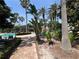 Landscaped pool area with lounge chairs provides a relaxing outdoor amenity for residents at 7320 Westpointe Blvd # 531, Orlando, FL 32835