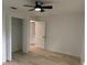 Bright bedroom with a closet and a ceiling fan at 901 Cascades Park Trl, Deland, FL 32720