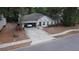 Charming single-story home with an attached carport and well-manicured landscaping at 901 Cascades Park Trl, Deland, FL 32720