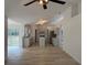 Open-concept kitchen with stainless steel appliances, an island, and spacious layout at 901 Cascades Park Trl, Deland, FL 32720
