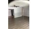 Spacious living room with luxury vinyl flooring and a ceiling fan at 1010 Dakota Ave, St Cloud, FL 34769