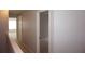 Hallway showing multiple doorways leading to rooms in the home at 1034 Enclair St, Orlando, FL 32828