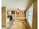 Open-plan kitchen features a large window that provides ample natural light at 106 Azalea Trl, Leesburg, FL 34748
