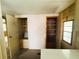 Storage space with plenty of shelving for kitchen appliances or pantry items at 106 Azalea Trl, Leesburg, FL 34748