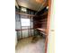 Utility room with shelving and partially-framed walls at 106 Azalea Trl, Leesburg, FL 34748