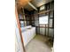 Utility room with washer and dryer and partially-framed walls at 106 Azalea Trl, Leesburg, FL 34748