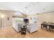 Bright living room with neutral tones, vaulted ceilings, and lots of natural light at 115 Henue Ct, Davenport, FL 33896