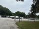 Outdoor storage lot with fenced perimeter at 15 Ne 63Rd Ct, Ocala, FL 34470
