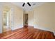 Hallway features hardwood floors, doorways to other rooms, and an inviting entryway at 1502 Hempel Ave, Windermere, FL 34786