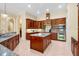 Gourmet kitchen featuring granite countertops, and stainless steel appliances at 1502 Hempel Ave, Windermere, FL 34786