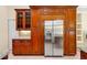 Gourmet kitchen featuring cherry cabinets and stainless steel refrigerator at 1502 Hempel Ave, Windermere, FL 34786