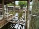 Waterfront property featuring a boat lift and access to the water at 24505 Snail Rd, Astor, FL 32102