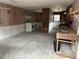 Large utility room with laundry appliances, workspace and lots of storage at 24505 Snail Rd, Astor, FL 32102