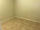 Neutral bedroom with tile flooring, offering a clean and simple design at 2470 Augusta Way, Kissimmee, FL 34746