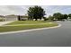 Well-maintained lawn and landscaping create inviting curb appeal to this house at 2470 Augusta Way, Kissimmee, FL 34746