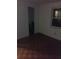This bedroom features neutral walls, wood parquet floors and a window for natural light at 2822 S Dean Rd, Orlando, FL 32825