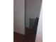 Small closet with a minimal design and baseboard at 2822 S Dean Rd, Orlando, FL 32825