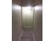 Hallway with a streamlined design and consistent paint palette at 2822 S Dean Rd, Orlando, FL 32825