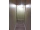 Hallway with a streamlined design and consistent paint palette at 2822 S Dean Rd, Orlando, FL 32825