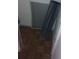 Inside this storage space, wood parquet floors are featured with vertical blinds at 2822 S Dean Rd, Orlando, FL 32825