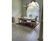 Bright dining area with a decorative light fixture and large window at 2913 Deerbrook Dr, Lakeland, FL 33811