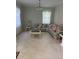 Living room with neutral tile flooring at 2913 Deerbrook Dr, Lakeland, FL 33811