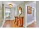 Elegant bathroom with a vintage vanity, ornate mirror, and decorative accents showcasing classic charm at 3450 Ohio Ave, Sanford, FL 32773