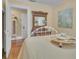 Charming bedroom features a decorative antique dresser and a unique bed-table at 3450 Ohio Ave, Sanford, FL 32773