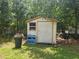 Wooden shed in backyard provides ample storage space with easy access at 360 Kentia Rd, Casselberry, FL 32707