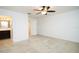 Neutral bedroom with ceiling fan and ensuite bathroom at 3850 Hampstead Ln, Lakeland, FL 33810