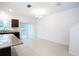 Open-concept dining area with sliding glass doors leading to outdoor space at 3850 Hampstead Ln, Lakeland, FL 33810