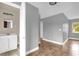 The hallway features tile flooring and a doorway to a bathroom at 5390 Botany Ct, Orlando, FL 32811