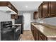 Updated kitchen features granite countertops, stainless steel appliances and ample cabinet space at 5390 Botany Ct, Orlando, FL 32811