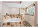 Beautiful bathroom featuring a soaking tub, glass shower with mosaic tile and glass block window at 615 Maple Forest Dr, Orlando, FL 32825