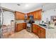 Functional kitchen with stainless steel appliances, granite countertops, and ample wood cabinetry at 615 Maple Forest Dr, Orlando, FL 32825