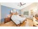 Inviting bedroom featuring stylish decor, soft lighting, and tiled floors at 615 Maple Forest Dr, Orlando, FL 32825