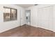 Empty bedroom with hardwood floors and closet at 7863 Sugar Bend Dr # 7863, Orlando, FL 32819