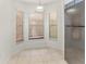 Bright dining area with tiled floor, lots of windows, and natural light at 7863 Sugar Bend Dr # 7863, Orlando, FL 32819