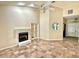 Bright living room featuring fireplace, tile floors, and natural lighting at 8044 Rural Retreat Ct, Orlando, FL 32819