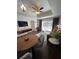 Bright living space with a dining area, modern furniture, and a view of the outdoor landscape at 1310 Seven Eagles Ct # 102, Reunion, FL 34747