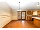 Cozy dining room with hardwood floors and French doors to the backyard at 1330 Englewood Dr, St Cloud, FL 34772