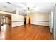 Spacious living room featuring hardwood floors and a ceiling fan at 1330 Englewood Dr, St Cloud, FL 34772