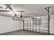 This garage features a ceiling fan, automatic door, and is ready for your workshop at 310 Dagama Ct, Kissimmee, FL 34758