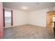Bright and airy living room with neutral paint, tile floors, and a large window for ample natural light at 4004 Prima Lago Cir, Lakeland, FL 33810