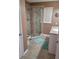 Modern bathroom with glass-enclosed shower, vanity, and tile flooring for a clean and stylish look at 527 San Pedro Dr, The Villages, FL 32159