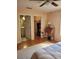 Comfortable bedroom with en-suite bathroom and walk-in closet, providing privacy and convenience at 527 San Pedro Dr, The Villages, FL 32159